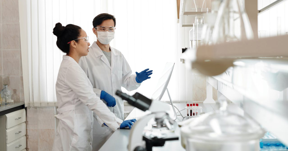 pexels-edward-jenner-4033147_small researchers in lab discussing